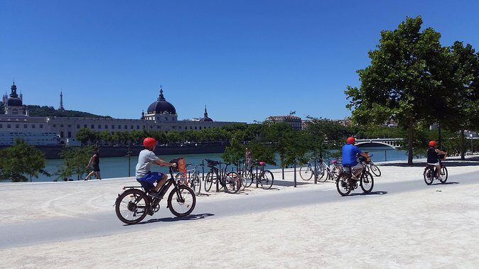 2h - Electric Bike Tour of Lyon with a Local Guide - First views at the Saône: Fourvière hill before you roll