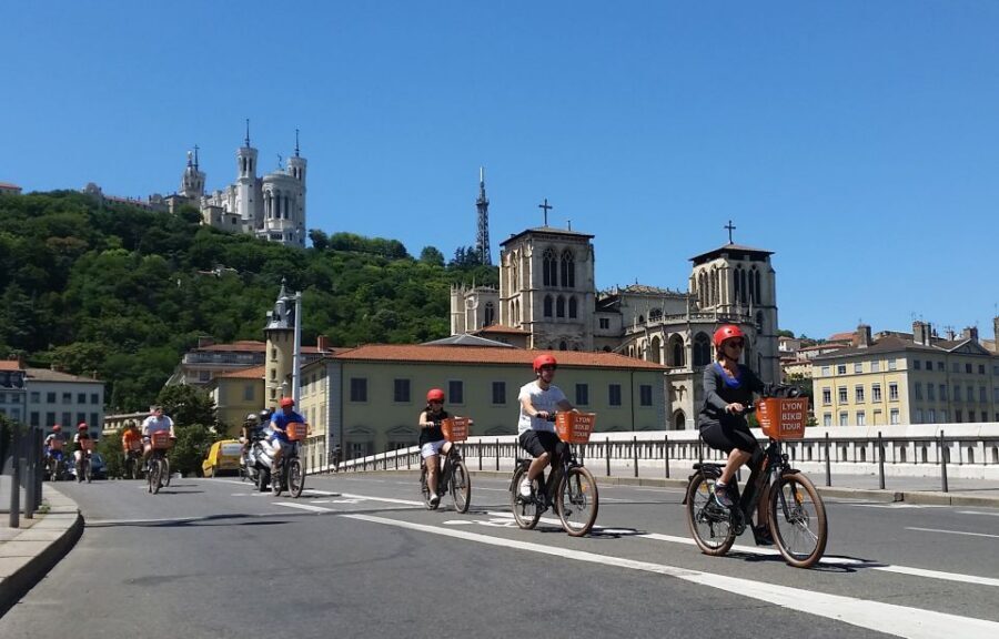 Lyon: 2-Hour Electric Bike Tour with a Local Guide - Place Bellecour: The Square That Keeps Lyon Centered