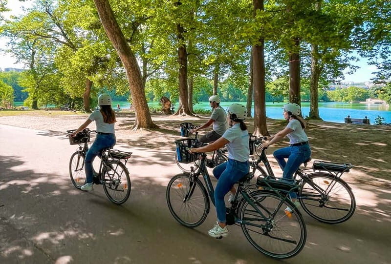 Lyon: Parc Tête d'Or eBike Tour - Inside the park: greenhouse, zoo animals, and the lake moment